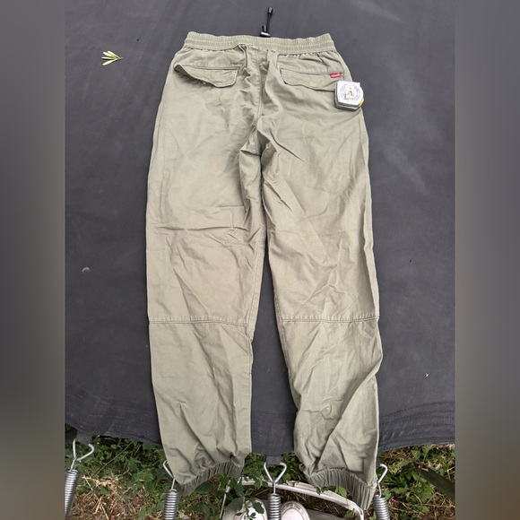 Men's Levis Olive cuffed waterproof trackPants size mens Xs - Picture 1 of 9